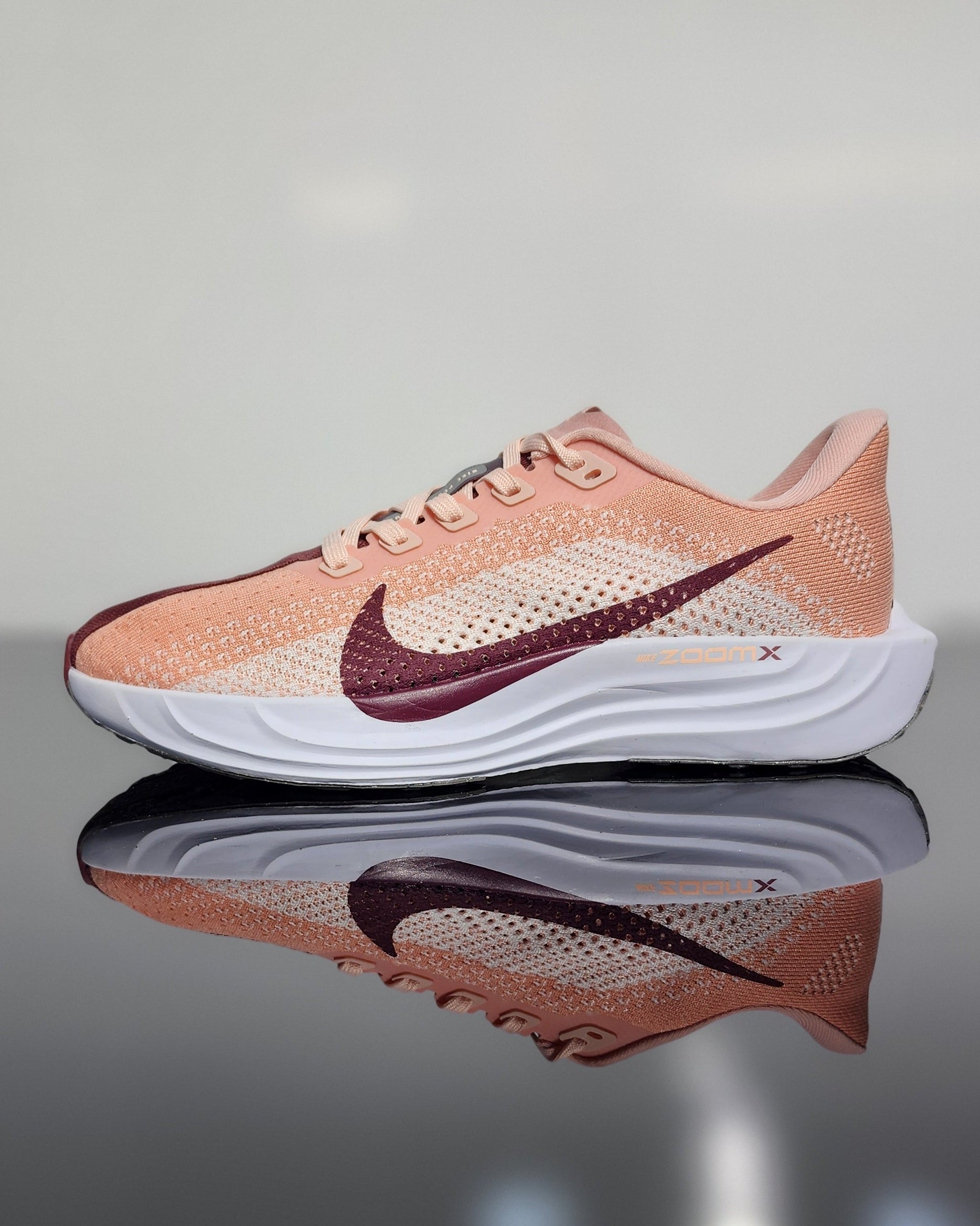 ატმისფერი Nike-ის ბოტასი